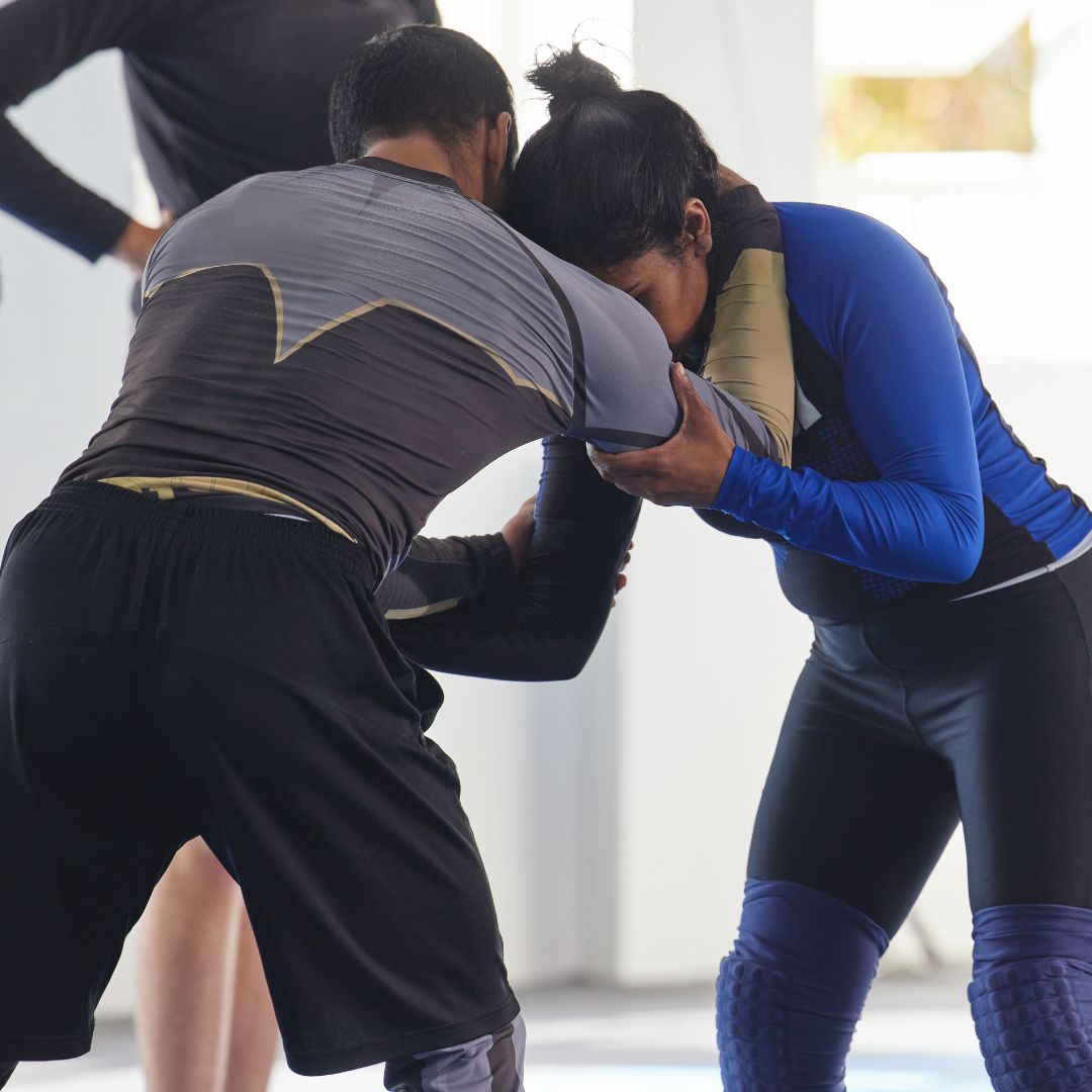 bjj Un homme et une femme qui font du Brazilian Jiu-Jitsu